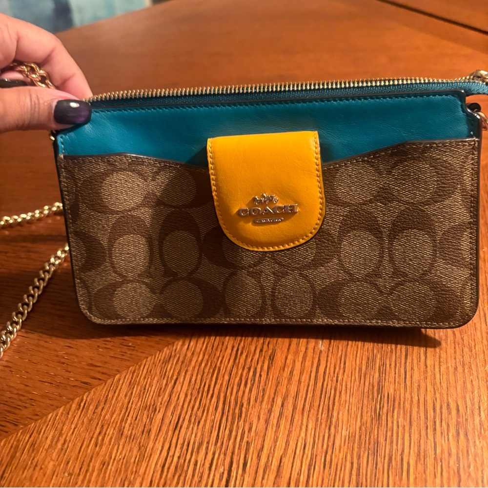 Multi Color Coach Crossbody bag.
